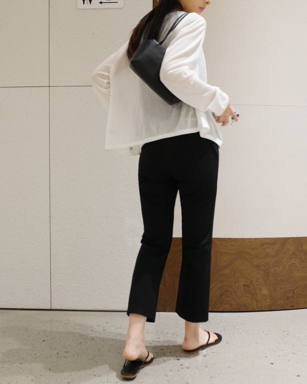 Slightly flared black pants, wardrobe essential versatile spring-summer cropped style
