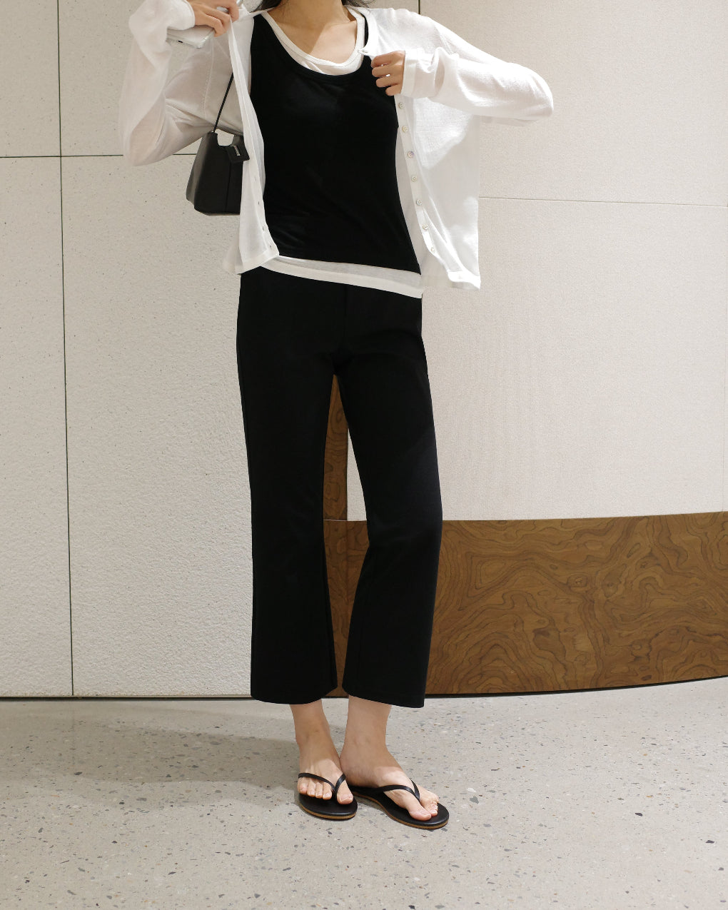 Slightly flared black pants, wardrobe essential versatile spring-summer cropped style