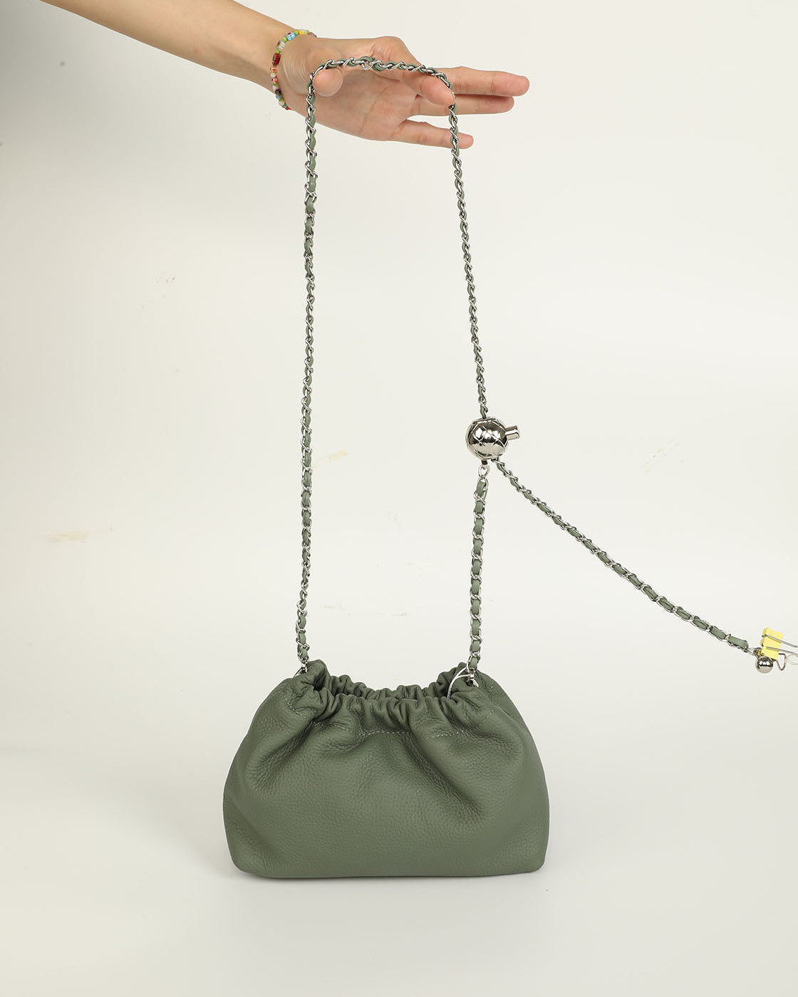 Crossbody chain bag with cloud-shaped design