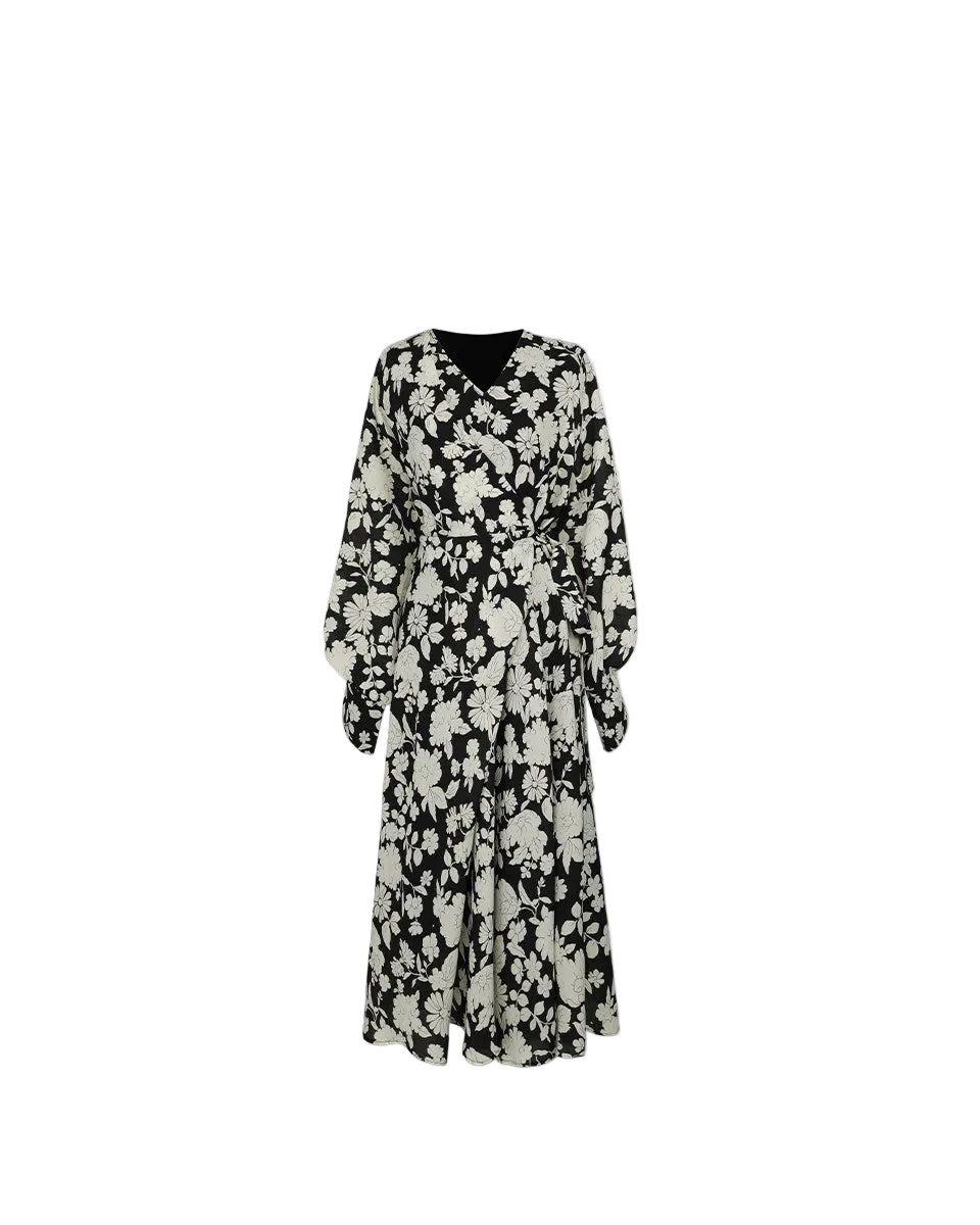 A loose-fitting long-sleeved floral dress with a slimming waist design